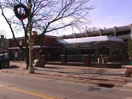 The Philips Avenue Diner in downtown Sioux Falls. The building is a shiny 1950's railcar diner with a brick addition.