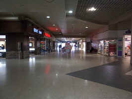 The northeast wing of the mall, taken from the center court. Stores visible include Riddles Jewelry, Claire's, Tradehome Shoes, and some empty stores.