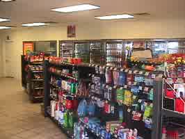 A gas station with tile flooring and in-ceiling fluorescent lighting.