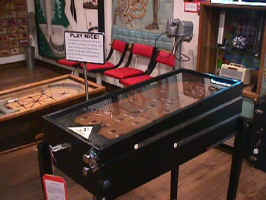 A look at the pinball tables. Both tables shown originate from the 1930's. A sign reminds you to play nice.