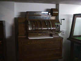 A large manual cash register.