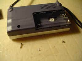 A photo of the back of the Indin BC-R22. Below the radio are two screws, a longer one on the left and a shorter one on the right.